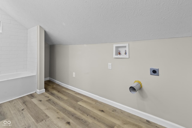 418 Harlan St, Indianapolis, IN 46201 - laundry area with hookup for an electric dryer, a textured ceiling, washer hookup, baseboards, and wood finished floors