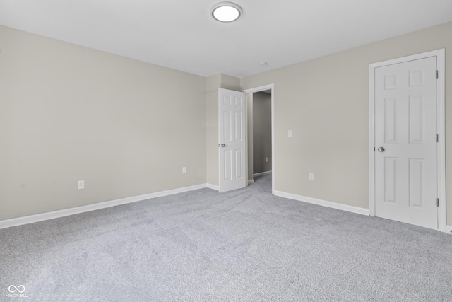 418 Harlan St, Indianapolis, IN 46201 - unfurnished bedroom featuring carpet floors and baseboards