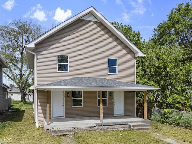 418 Harlan St, Indianapolis, IN 46201 - rear view of house featuring a porch