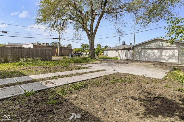418 Harlan St, Indianapolis, IN 46201 - view of yard with driveway and a garage