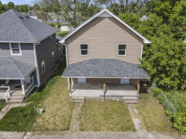 418 Harlan St, Indianapolis, IN 46201 - back of house with a yard, a porch, and a patio
