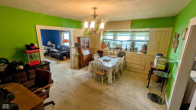 100 N 6th Ave, Beech Grove, IN 46107 - dining room featuring a chandelier, a textured ceiling, plenty of natural light, and light carpet