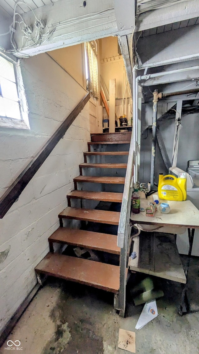 100 N 6th Ave, Beech Grove, IN 46107 - staircase featuring unfinished concrete floors and concrete block wall