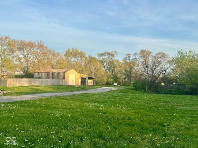 2931 Byrkit St, Indianapolis, IN 46217 - view of yard featuring an outbuilding and a garage
