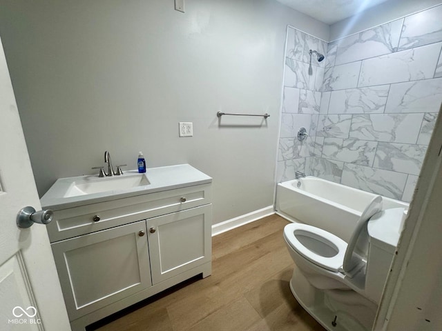 2931 Byrkit St, Indianapolis, IN 46217 - bathroom with vanity, shower / bath combination, and wood finished floors