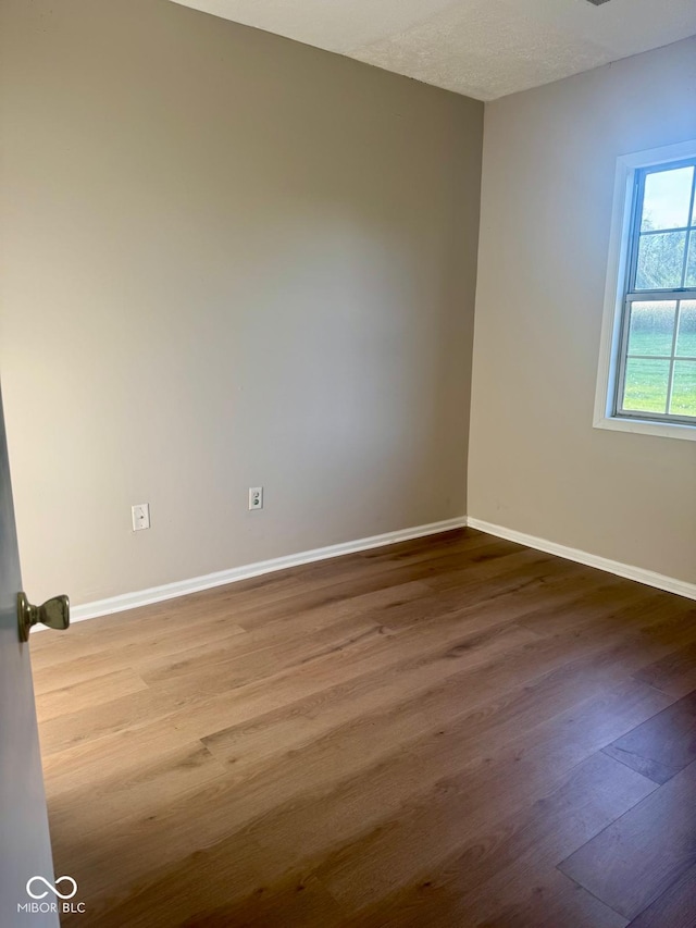 2931 Byrkit St, Indianapolis, IN 46217 - unfurnished room with wood finished floors and baseboards