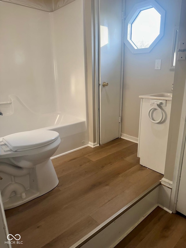 2931 Byrkit St, Indianapolis, IN 46217 - full bath with wood finished floors, vanity, and a shower