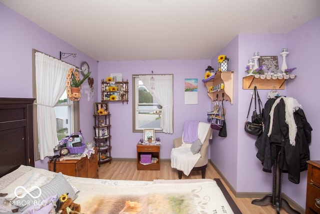 6190 E County Road 800 N, North Vernon, IN 47265 - bedroom featuring light wood-style floors and baseboards