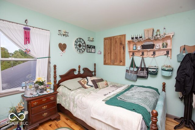 6190 E County Road 800 N, North Vernon, IN 47265 - bedroom featuring light wood-style floors