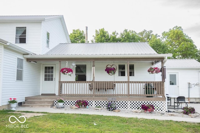 6190 E County Road 800 N, North Vernon, IN 47265 - view of front of property with a porch and metal roof