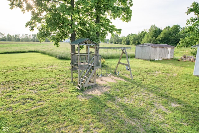 6190 E County Road 800 N, North Vernon, IN 47265 - view of grassy yard featuring an outdoor structure and a view of rural / pastoral area