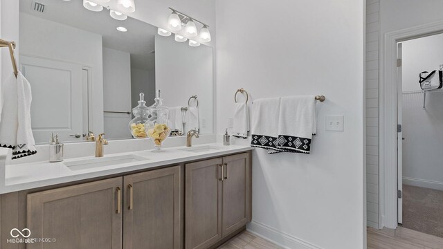 14866 E Keenan Cir Lot 38, Westfield, IN 46074 - full bathroom with double vanity, baseboards, and recessed lighting