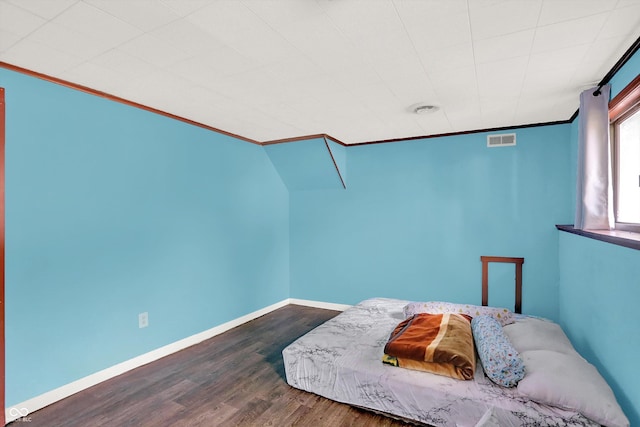 7915 Broadview Dr, Indianapolis, IN 46227 - bedroom featuring ornamental molding, dark wood-style flooring, and baseboards