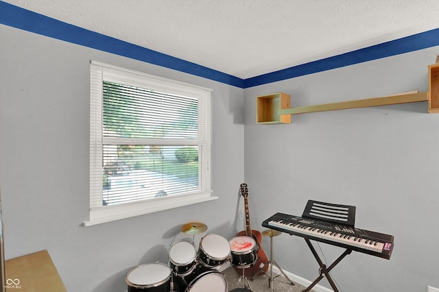 7915 Broadview Dr, Indianapolis, IN 46227 - misc room with healthy amount of natural light and a textured ceiling
