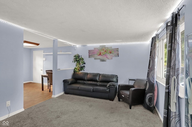 7915 Broadview Dr, Indianapolis, IN 46227 - living area featuring carpet, a textured ceiling, and baseboards
