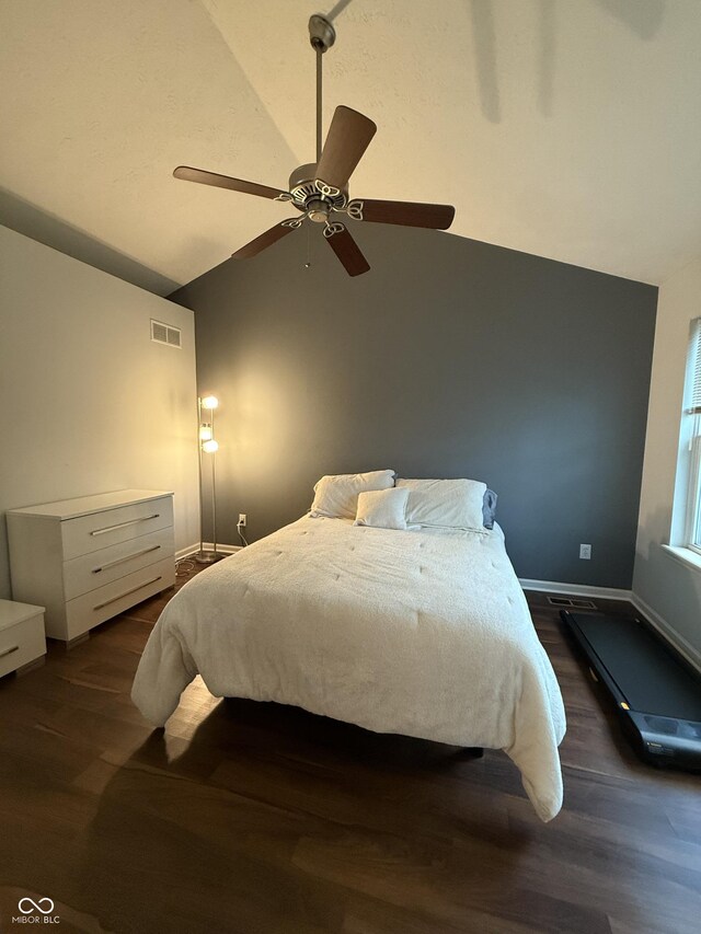 9535 Longwell Dr, Indianapolis, IN 46240 - bedroom with lofted ceiling, dark wood-type flooring, baseboards, and ceiling fan