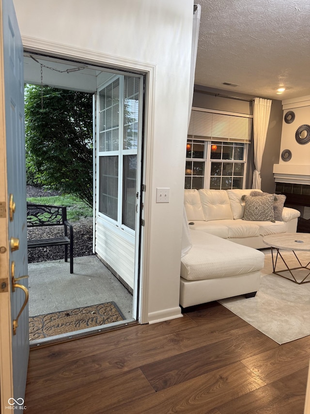 9535 Longwell Dr, Indianapolis, IN 46240 - living area with wood finished floors and a textured ceiling
