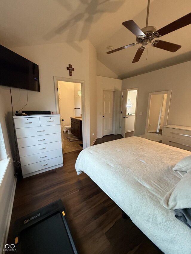 9535 Longwell Dr, Indianapolis, IN 46240 - bedroom with dark wood finished floors, lofted ceiling, ensuite bath, and ceiling fan
