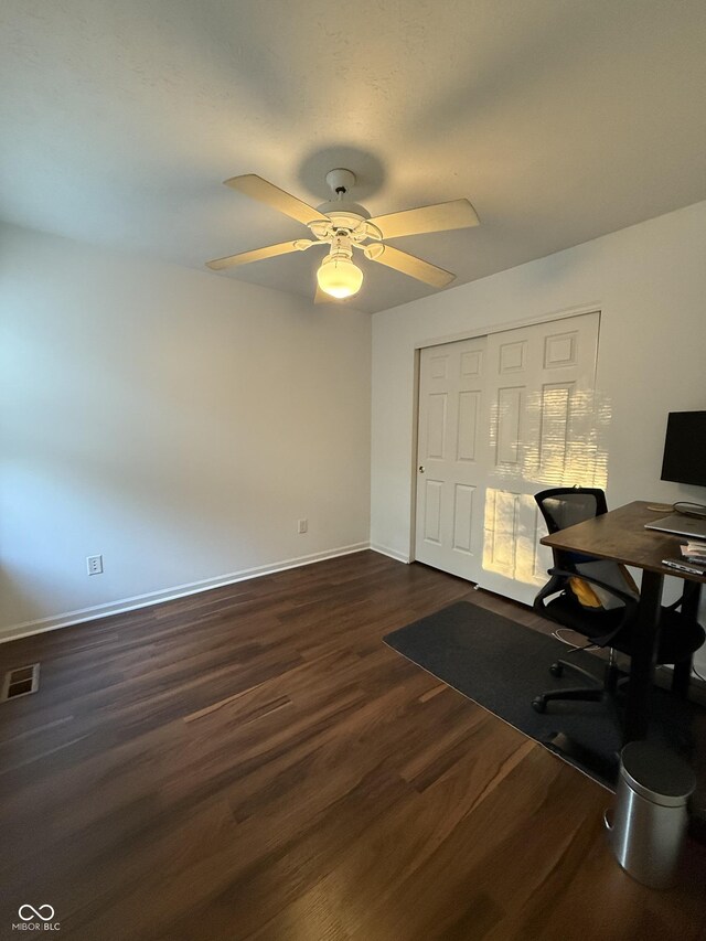 9535 Longwell Dr, Indianapolis, IN 46240 - office area featuring dark wood-style flooring, baseboards, and a ceiling fan