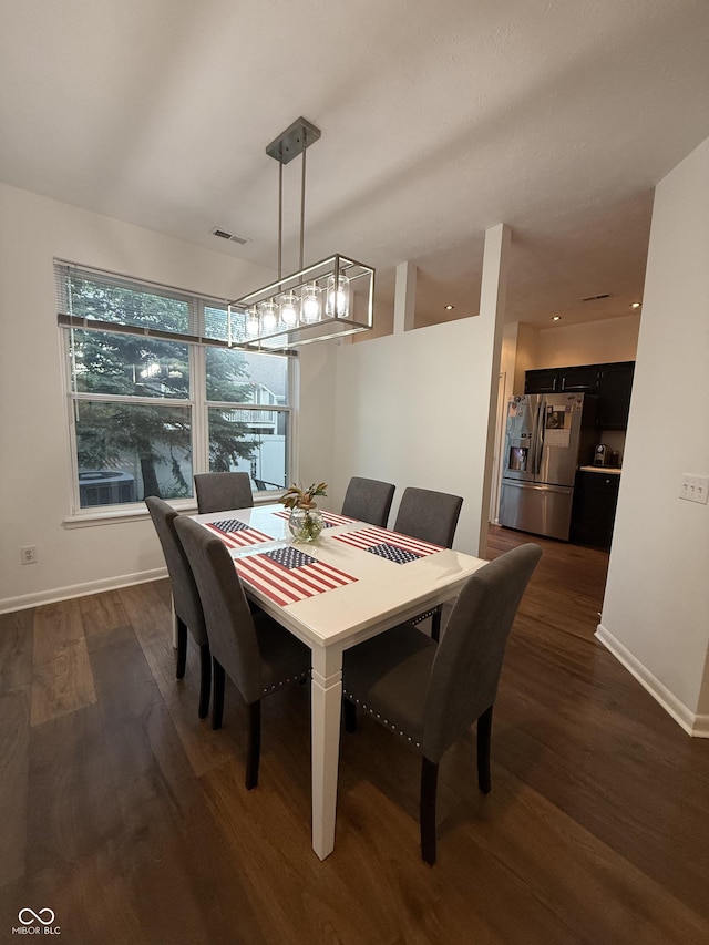 9535 Longwell Dr, Indianapolis, IN 46240 - dining room with dark wood finished floors and baseboards