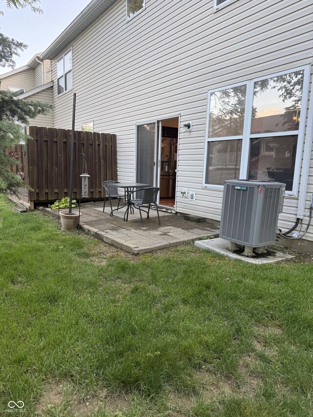 9535 Longwell Dr, Indianapolis, IN 46240 - back of property with central AC unit and a patio area