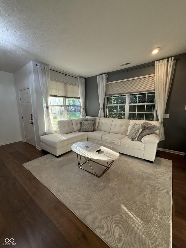 9535 Longwell Dr, Indianapolis, IN 46240 - living room featuring wood finished floors, baseboards, and recessed lighting