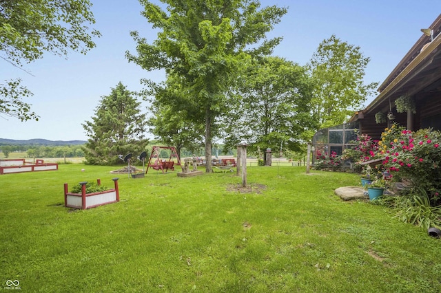 10484 N County Road 750 W, Freetown, IN 47235 - view of green lawn featuring a vegetable garden