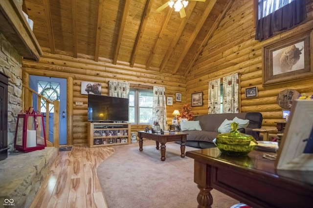 10484 N County Road 750 W, Freetown, IN 47235 - living area featuring high vaulted ceiling, wood ceiling with exposed beams, wood finished floors, ceiling fan, and log walls