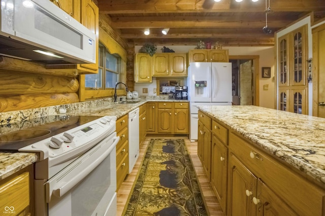 10484 N County Road 750 W, Freetown, IN 47235 - kitchen featuring white appliances, a sink, wood finished floors, light stone counters, and beam ceiling