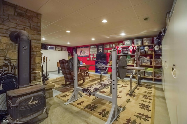 10484 N County Road 750 W, Freetown, IN 47235 - exercise area featuring a paneled ceiling and a wood stove