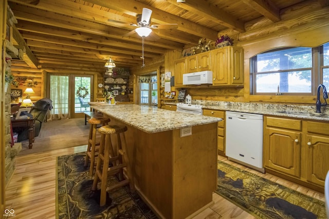 10484 N County Road 750 W, Freetown, IN 47235 - kitchen featuring white appliances, a sink, wooden ceiling with exposed beams, light wood-style flooring, and light stone counters
