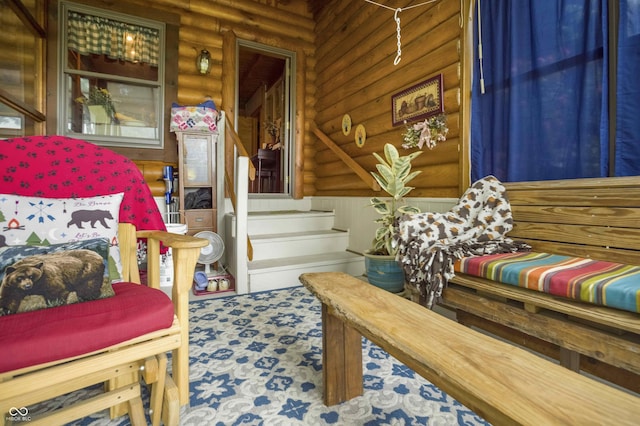 10484 N County Road 750 W, Freetown, IN 47235 - bedroom with log walls and carpet floors