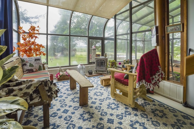 10484 N County Road 750 W, Freetown, IN 47235 - sunroom with a wood stove and carpet flooring