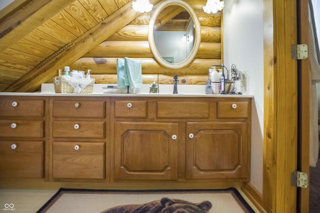 10484 N County Road 750 W, Freetown, IN 47235 - bathroom with log walls and vanity