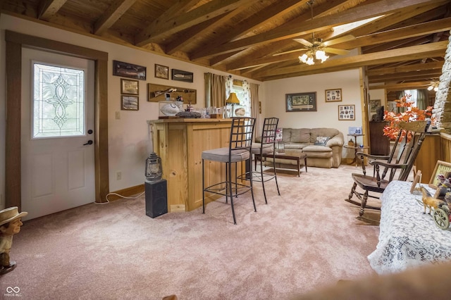 10484 N County Road 750 W, Freetown, IN 47235 - living area with wood ceiling with exposed beams, light colored carpet, and a ceiling fan