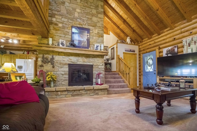 10484 N County Road 750 W, Freetown, IN 47235 - living area featuring wood ceiling with exposed beams, stairs, a fireplace, carpet floors, and high vaulted ceiling