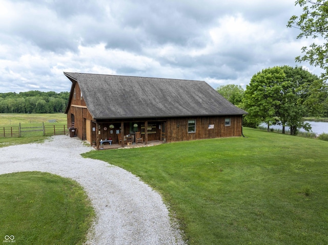 10484 N County Road 750 W, Freetown, IN 47235 - view of front of home with a barn, driveway, and an outbuilding