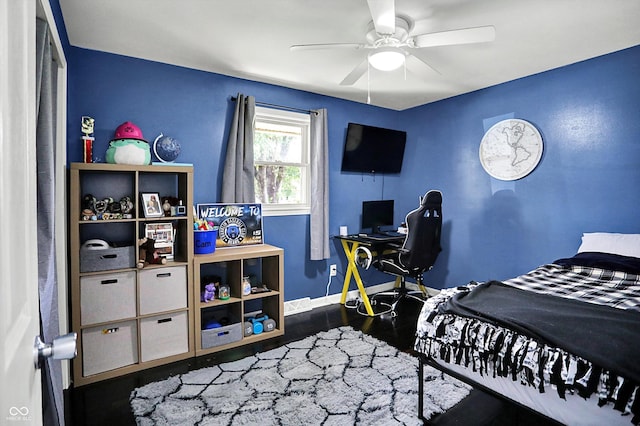 356 Daugherty St, Columbus, IN 47201 - bedroom featuring baseboards, wood finished floors, and ceiling fan