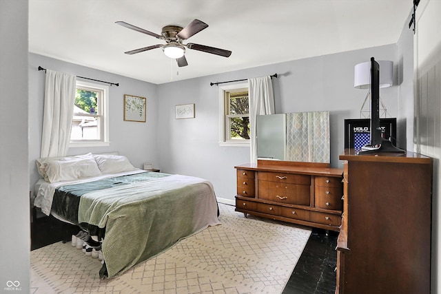 356 Daugherty St, Columbus, IN 47201 - bedroom featuring multiple windows, baseboards, and ceiling fan