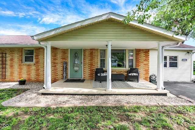 356 Daugherty St, Columbus, IN 47201 - back of property featuring brick siding and outdoor lounge area