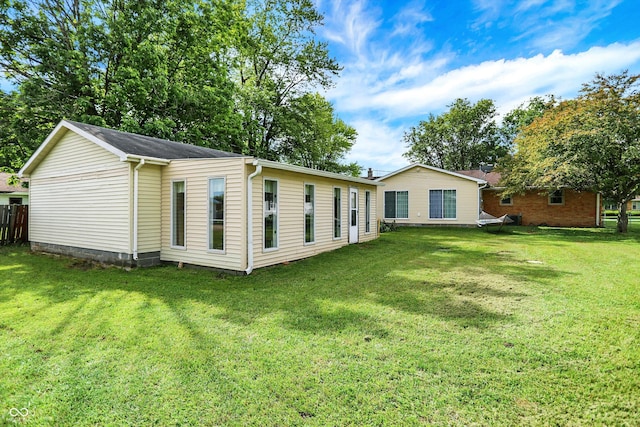 356 Daugherty St, Columbus, IN 47201 - rear view of property featuring a lawn