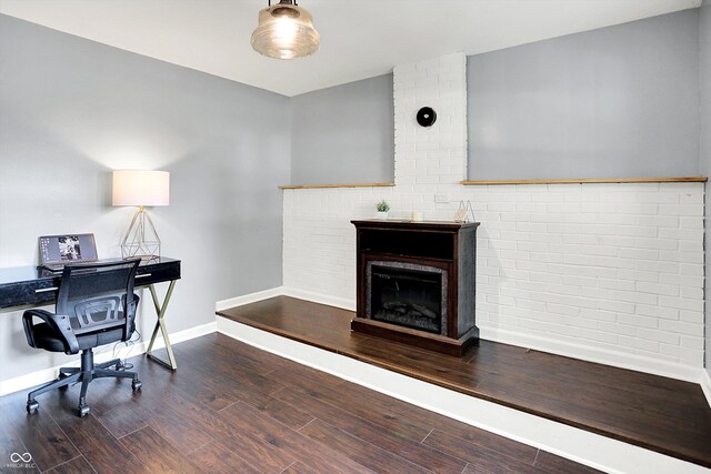 356 Daugherty St, Columbus, IN 47201 - office with baseboards, wood finished floors, and a fireplace