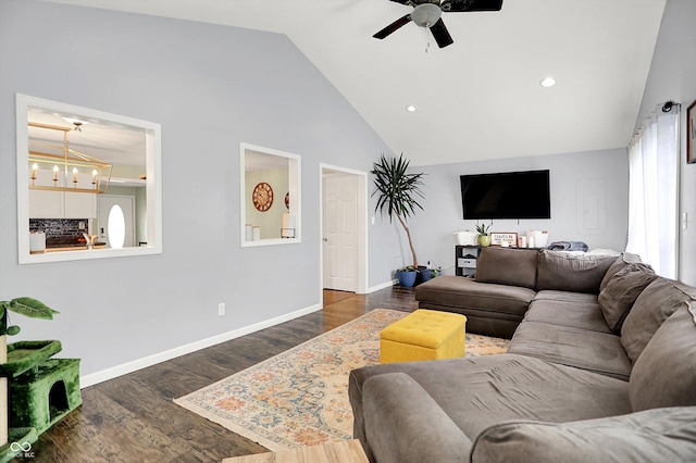 356 Daugherty St, Columbus, IN 47201 - living area featuring a ceiling fan, wood finished floors, a chandelier, baseboards, and high vaulted ceiling