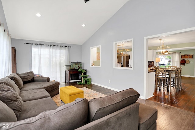 356 Daugherty St, Columbus, IN 47201 - living room featuring dark wood-style floors, high vaulted ceiling, baseboards, and recessed lighting