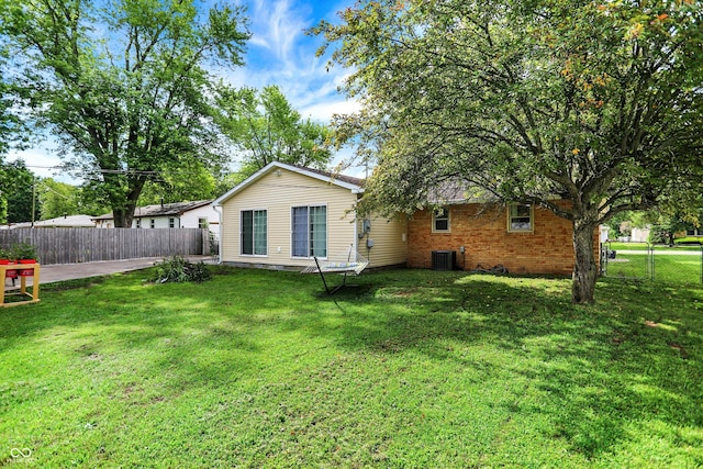 356 Daugherty St, Columbus, IN 47201 - rear view of property featuring brick siding and cooling unit