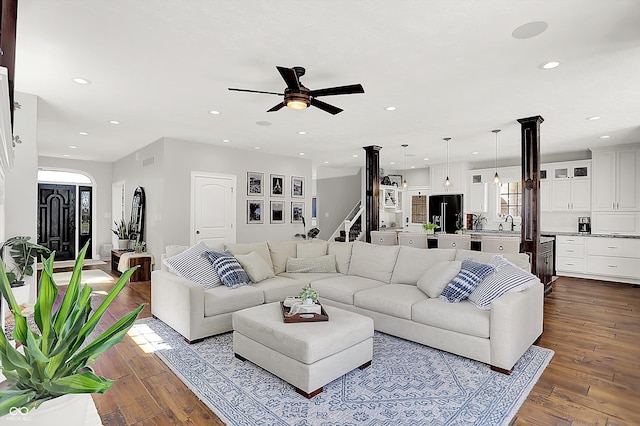 3398 Nottinghill Blvd, Plainfield, IN 46168 - living area with ceiling fan, recessed lighting, hardwood / wood-style flooring, stairway, and plenty of natural light