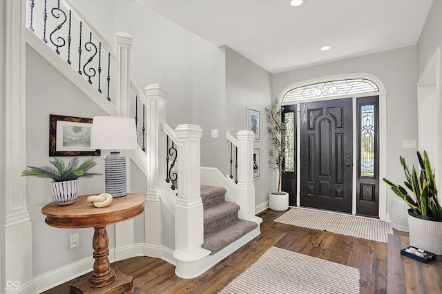 3398 Nottinghill Blvd, Plainfield, IN 46168 - foyer featuring stairway, dark wood finished floors, recessed lighting, and baseboards