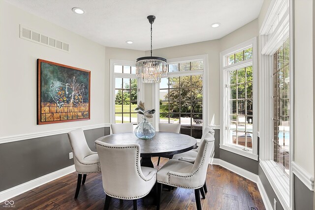 3398 Nottinghill Blvd, Plainfield, IN 46168 - dining area featuring baseboards, a chandelier, plenty of natural light, dark wood-style flooring, and recessed lighting