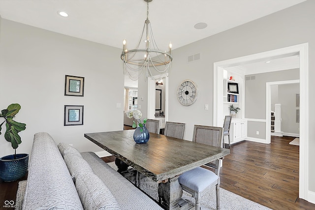 3398 Nottinghill Blvd, Plainfield, IN 46168 - dining room featuring a chandelier, dark wood-type flooring, recessed lighting, and baseboards