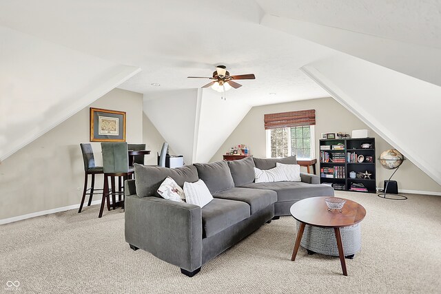 3398 Nottinghill Blvd, Plainfield, IN 46168 - carpeted living area with lofted ceiling, a ceiling fan, and baseboards